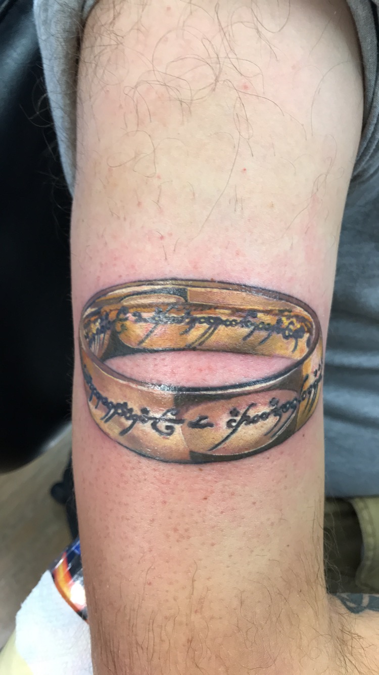 A man with a tattoo on his arm standing in a ring photo – Free Fight  position Image on Unsplash